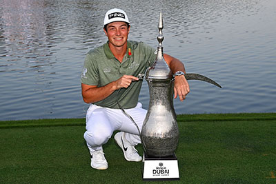 Viktor-ious! Hovland bags maiden Dubai Desert Classic with thrilling play-off win over Bland